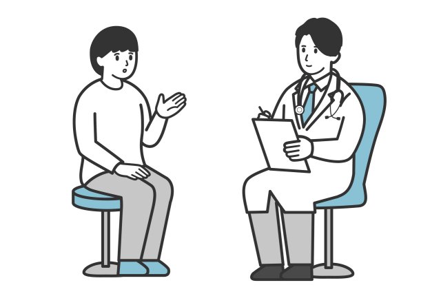 診察を行う医師と患者